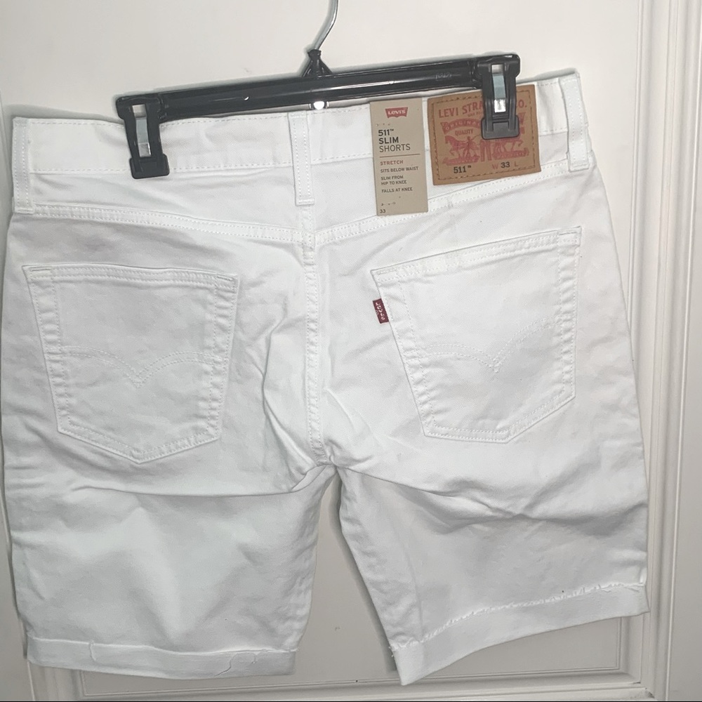NWT Cute pair of white jean shorts these are a size 33. - Picture 3 of 4